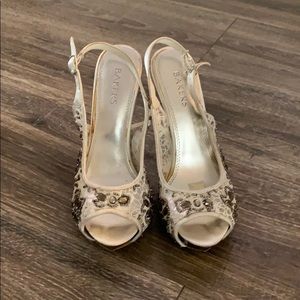 Sling back peep toe heels